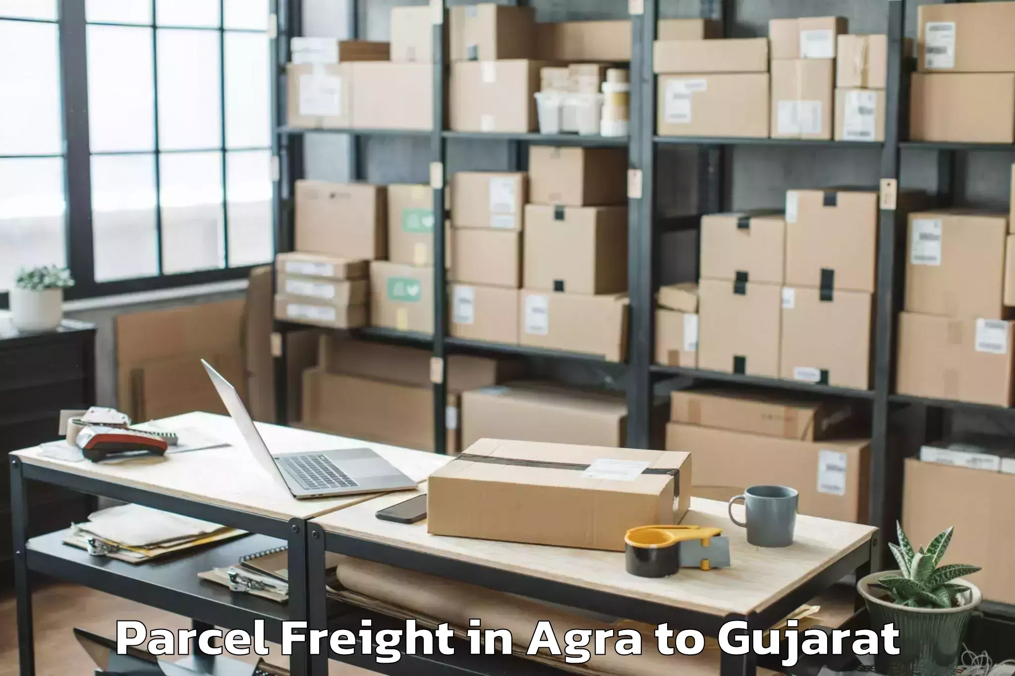 Easy Agra to Khedbrahma Parcel Freight Booking